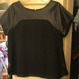 Black short sleeve blouse with leather accents